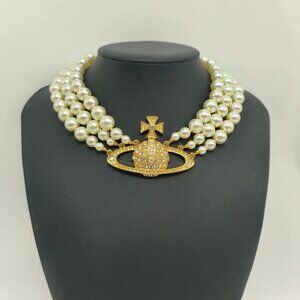 Vivienne Westwood Triple-Layer Pearl Necklace with Gold Saturn Pendant